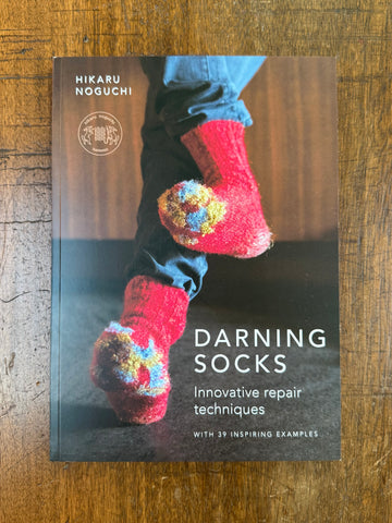 Darning Socks by Hikaru Noguchi